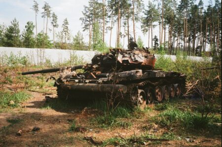 battle tank on green grass field